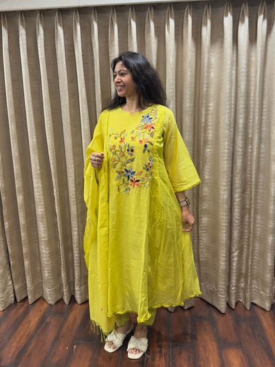 Lemon yellow  Fabric soft pure mul chanderi  lightweight pattern with floral multicolor weaved on upper front with same fabric silhouette & dupatta fringed edges for vibrant look