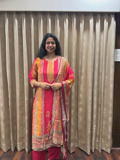 Bright pink base with multi color print patterns