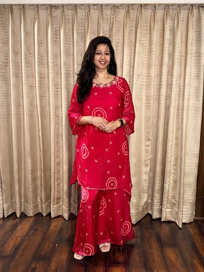 Fabric, pure tissue bandage print 2 pieces, featuring intricate sequin and beats work on the neck line with flared bottom of same fabric