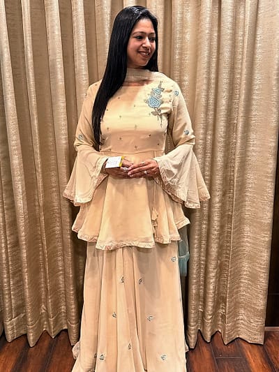 BEIGH GHAGRA WITH PEPLOM TOP AND DUPATTA